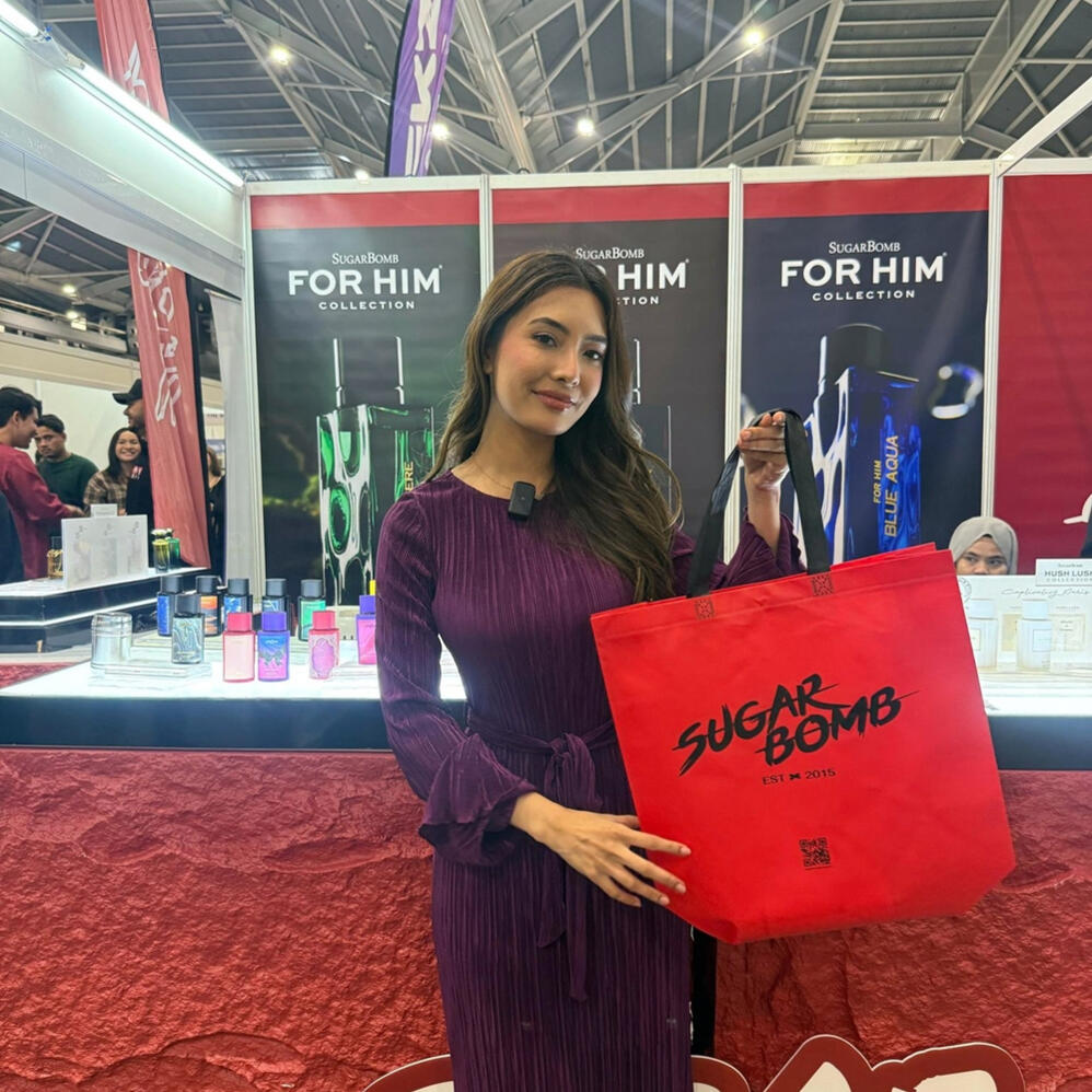 Our popular SugarBomb For Him Collection at our latest Singapore event. A promotional model showcasing the best perfume store products from SugarBomb SG's long-lasting fragrance line in Singapore.
